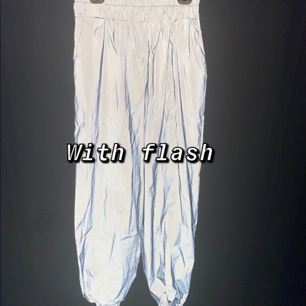 Woman’s street fashion, reflective pants